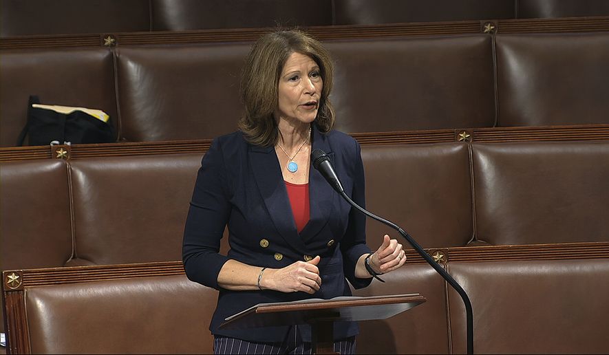 In this file photo, Rep. Cheri Bustos, D-Ill., speaks on the floor of the House of Representatives at the U.S. Capitol in Washington. Mrs. Bustos is one of a number of House Democrats electing to retire in 2022 rather than run for reelection. (House Television via AP, File)