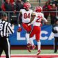 Maryland tight end Corey Dyches (84) celebrates with running back Colby McDonald (23) after scoring a touchdown against Rutgers during the first half of an NCAA football game, Saturday, Nov. 27, 2021, in Piscataway, N.J. (AP Photo/Noah K. Murray)