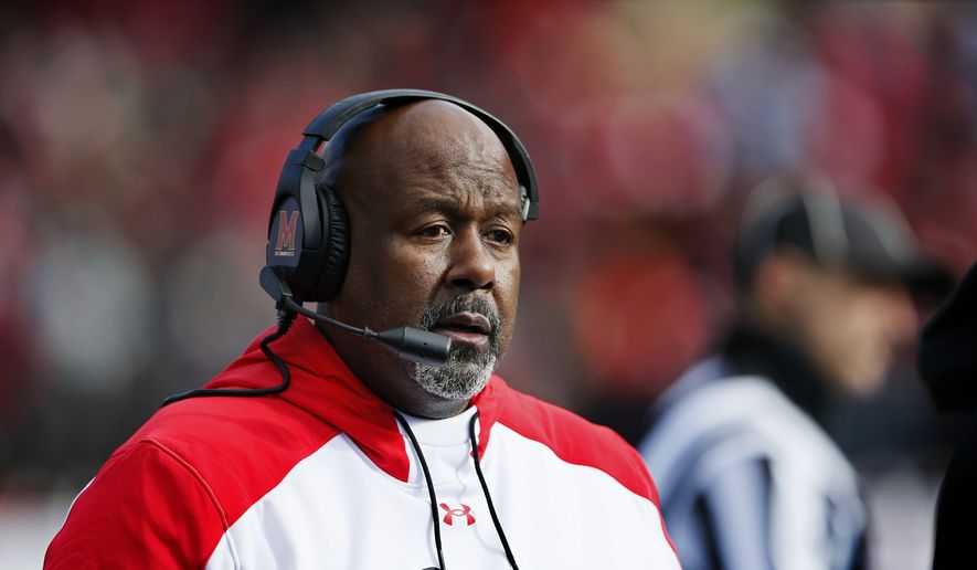 Maryland head coach Mike Locksley watches during the first half of an NCAA football game against Rutgers, Saturday, Nov. 27, 2021, in Piscataway, N.J. (AP Photo/Noah K. Murray) ** FILE **