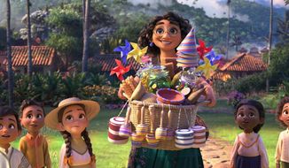 This image released by Disney shows Mirabel, voiced by Stephanie Beatriz, in a scene from the animated film &amp;quot;Encanto.&amp;quot; (Disney via AP)