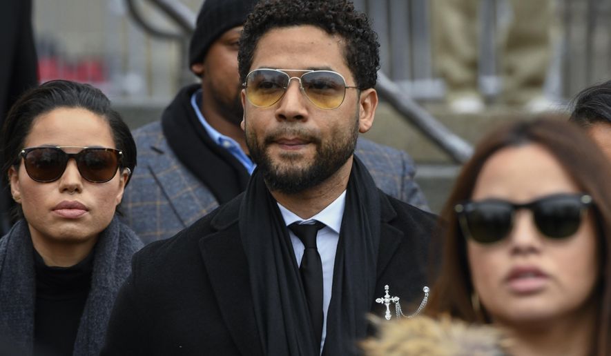 FILE - Former &amp;quot;Empire&amp;quot; actor Jussie Smollett leaves the Leighton Criminal Courthouse in Chicago, Feb. 24, 2020. Smollett&#39;s trial will boil down to the question of whether the jury believes the actor&#39;s version of what he says was a racist and homophobic attack or that told by two brothers who say they helped the actor fake the attack. The trial starts with jury selection Monday, Nov. 29, 2021 and is expected to last a week. (AP Photo/Matt Marton, file)