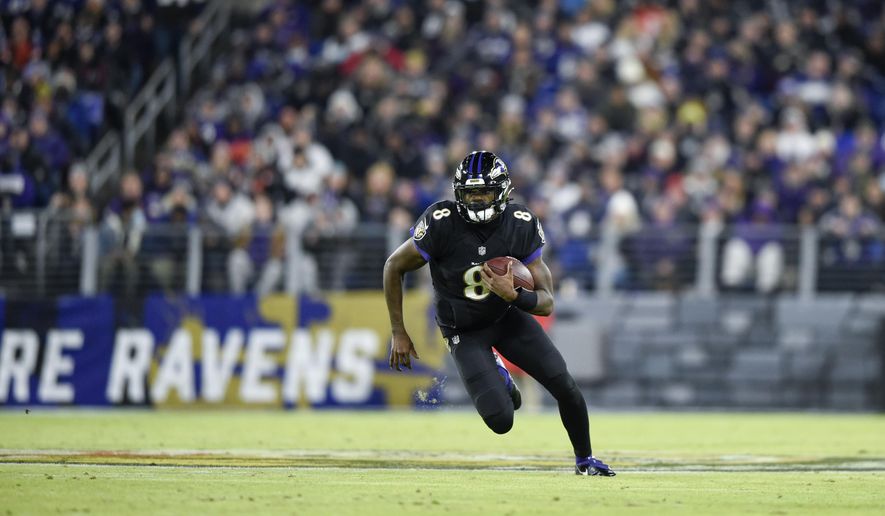 Baltimore Ravens quarterback Lamar Jackson scrambles against the Cleveland Browns during the first half of an NFL football game, Sunday, Nov. 28, 2021, in Baltimore. (AP Photo/Gail Burton) **FILE**