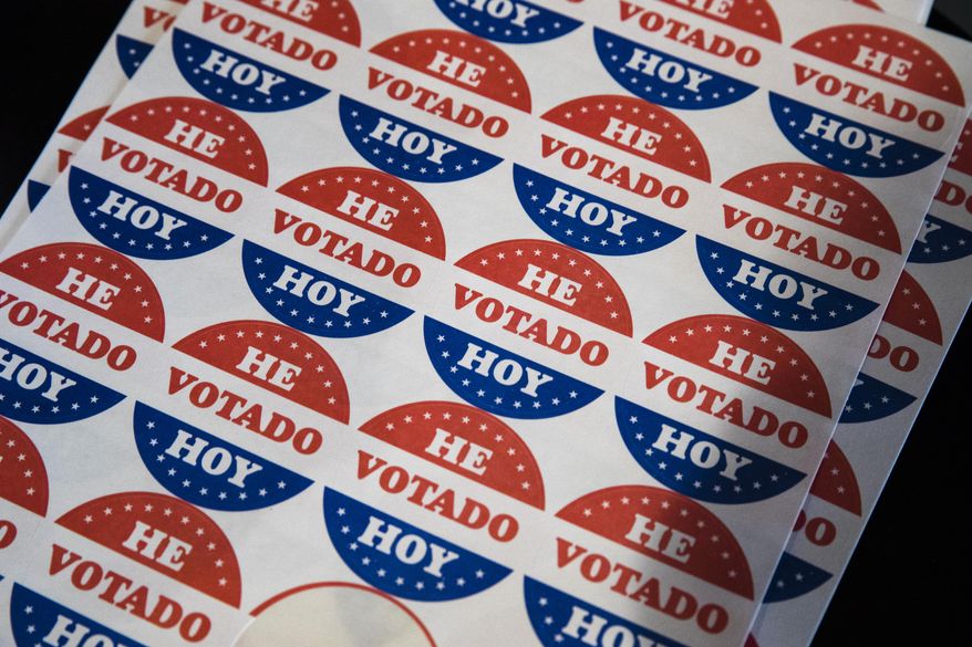 Shown in the Spanish language are &amp;quot;He Votado Hoy&amp;quot; stickers or I voted today at a polling place in Philadelphia, May 21, 2019. This month’s elections may have offered a preview of the Spanish-language misinformation that could pose a growing threat to Democrats, who are already anxious about their standing with Latino voters after losing some ground with them last year. (AP Photo/Matt Rourke, File)
