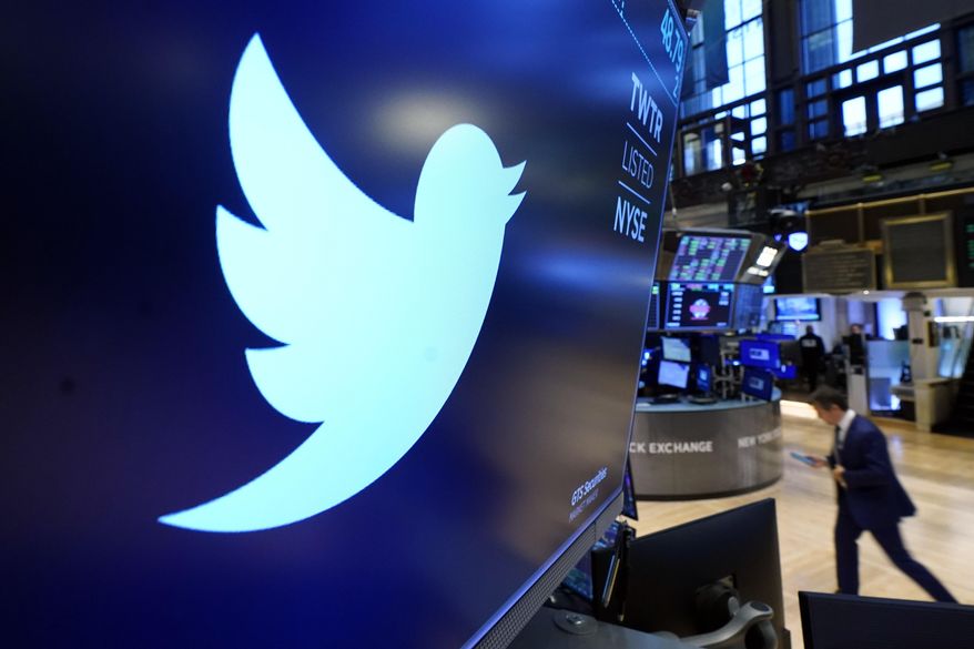 The logo for Twitter appears above a trading post on the floor of the New York Stock Exchange, Monday, Nov. 29, 2021. Twitter co-founder Jack Dorsey will step down as CEO of the social media platform, the company announced. He will be succeeded by Twitter&#39;s current Chief Technology Officer Parag Agrawal. (AP Photo/Richard Drew)