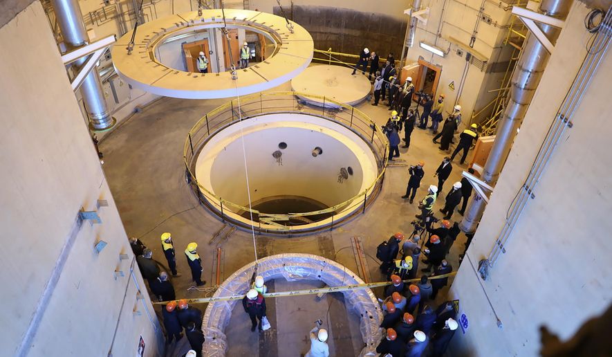 FILE—In this photo released by the Atomic Energy Organization of Iran, technicians work at the Arak heavy water reactor&#39;s secondary circuit, as officials and media visit the site, near Arak, 150 miles (250 kilometers) southwest of the capital Tehran, Iran, Dec. 23, 2019. On Monday, Nov. 29, 2021, negotiators are gathering in Vienna to resume efforts to revive Iran&#39;s 2015 nuclear deal with world powers, with hopes of quick progress muted after the arrival of a hard-line new government in Tehran led to a more than five-month hiatus. (Atomic Energy Organization of Iran via AP, File)