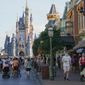 Guests stroll along Main Street at the Magic Kingdom theme park at Walt Disney World, Monday, Aug. 30, 2021, in Lake Buena Vista, Fla. (AP Photo/John Raoux, File)
