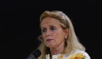 Rep. Debbie Dingell, D-Mich., addresses the media during a visit to the Water Resource Recovery Facility, July 8, 2021, in Detroit. A suburban Detroit office of Dingell&#39;s has been broken into and ransacked, with memorabilia belonging to her late husband and longtime Congressman John Dingell damaged. Dingell reported the break-in at the office in Dearborn on Monday, Nov. 29, 2021 and said it was being investigated by local and U.S. Capitol police. (AP Photo/Carlos Osorio, file)