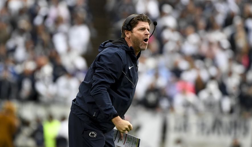 Penn State defensive coordinator Brent Pry coaches against Illinois during an NCAA college football game in State College, Pa. on Saturday, Oct. 23, 2021. (AP Photo/Barry Reeger, File) **FILE**