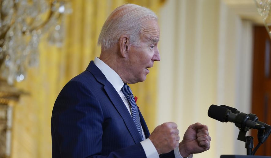 President Joe Biden speaks to commemorate World AIDS Day during an event in the East Room of the White House, Wednesday, Dec. 1, 2021, in Washington. (AP Photo/Evan Vucci)