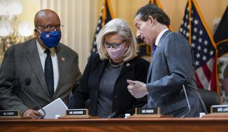 From left, Chairman Bennie Thompson, D-Miss., Vice Chair Liz Cheney, R-Wyo., and Rep. Jamie Raskin, D-Md., finish meeting as the House panel investigating the Jan. 6 U.S. Capitol insurrection voted to pursue contempt charges against Jeffrey Clark, a former Justice Department lawyer who aligned with former President Donald Trump as Trump tried to overturn his election defeat, at the Capitol in Washington, Wednesday, Dec. 1, 2021. (AP Photo/J. Scott Applewhite)