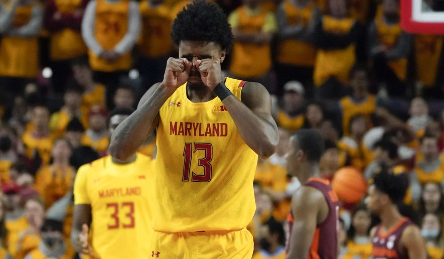 Maryland guard Hakim Hart reacts after a play against Virginia Tech during the first half of an NCAA college basketball game, Wednesday, Dec. 1, 2021, in College Park, Md. (AP Photo/Julio Cortez)