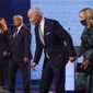 In this Sept. 29, 2020, photo, from left, first lady Melania Trump, President Donald Trump, Democratic presidential candidate former Vice President Joe Biden and Jill Biden during the first presidential debate at Case Western University and Cleveland Clinic, in Cleveland, Ohio. A book by Donald Trump&#39;s ex-chief of staff says Trump tested positive for COVID-19 three days before his first debate in September 2020. (AP Photo/Julio Cortez, File)