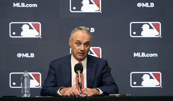 Major League Baseball commissioner Rob Manfred speaks during a news conference in Arlington, Texas, Thursday, Dec. 2, 2021. Owners locked out players at 12:01 a.m. Thursday following the expiration of the sport&#39;s five-year collective bargaining agreement. (AP Photo/LM Otero)