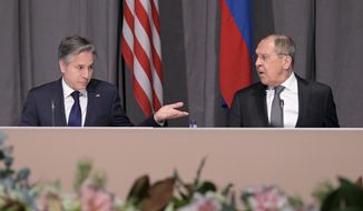 US Secretary of State Antony Blinken, left, and Russian Foreign Minister Sergey Lavrov meet on the sidelines of an Organization for Security and Co-operation in Europe (OSCE) meeting, in Stockholm, Sweden, Thursday, Dec. 2, 2021. (Jonathan Nackstrand/Pool Photo via AP)