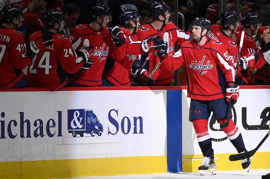 Washington Capitals center Evgeny Kuznetsov (92) celebrates his goal during the second period of the team's NHL hockey game against the Chicago Blackhawks, Thursday, Dec. 2, 2021, in Washington. (AP Photo/Nick Wass) **FILE**