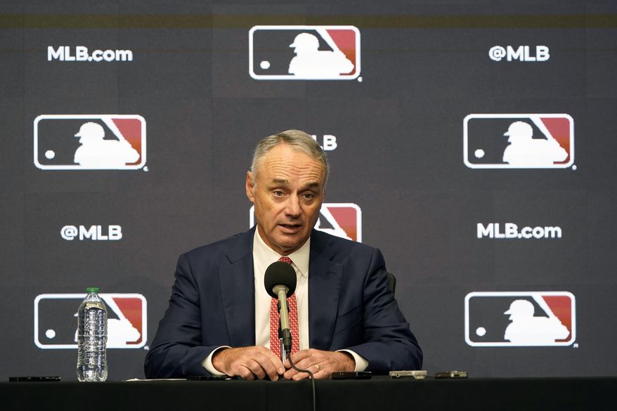 Major League Baseball commissioner Rob Manfred speaks during a news conference in Arlington, Texas, Thursday, Dec. 2, 2021. Owners locked out players at 12:01 a.m. Thursday following the expiration of the sport&#x27;s five-year collective bargaining agreement. (AP Photo/LM Otero)