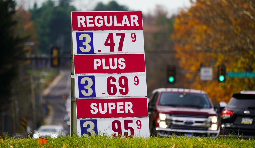 Gasoline prices are displayed at a station in Huntingdon Valley, Pa., Wednesday, Nov. 17, 2021. OPEC and allied oil-producing countries meet Thursday, Dec. 2, 2021, under the shadow of a surprise new COVID-19 threat, with uncertainty over the omicron variant&#39;s future impact on the global economic recovery hanging over their decision on how much oil to pump to a world that is paying more for gasoline.  (AP Photo/Matt Rourke)