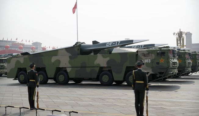Chinese military vehicles carrying DF-17 ballistic missiles roll during a parade to commemorate the 70th anniversary of the founding of Communist China in Beijing, on Oct. 1, 2019. U.S. Defense Secretary Lloyd Austin said Thursday, Dec. 2, 2021, that China’s pursuit of hypersonic weapons “increases tensions in the region” and vowed the U.S. would maintain its capability to deter potential threats posed by China. (AP Photo/Ng Han Guan, File)