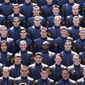Carlton Shelley II, center, is seen in this photo of the graduating class of 2013 at the U.S. Military Academy at West Point, N.Y. Shelley was recruited to play football for West Point from his Sarasota, Fla., high school and entered the academy in 2009. (U.S. Military Academy via AP)