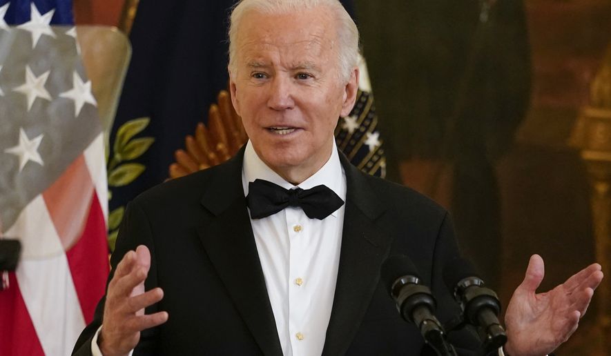 President Joe Biden speaks as he and first lady Jill Biden host the Kennedy Center Honorees Reception at the White House in Washington, Sunday, Dec. 5, 2021. The 2021 Kennedy Center honorees include Motown Records creator Berry Gordy, Saturday Night Live mastermind Lorne Michaels, actress-singer Bette Midler, opera singer Justino Diaz and folk music legend Joni Mitchell. (AP Photo/Carolyn Kaster)