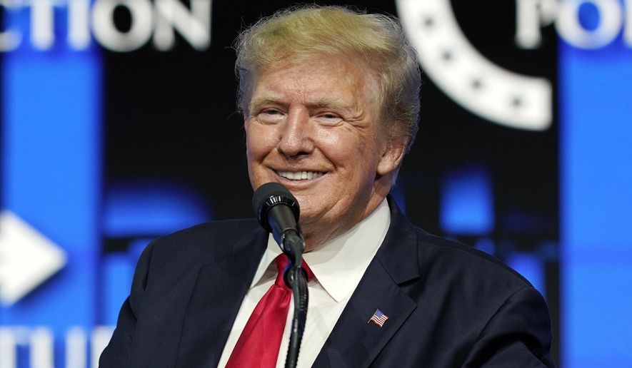 In this July 24, 2021, file photo former President Donald Trump smiles as he pauses while speaking to supporters at a Turning Point Action gathering in Phoenix, Arizona. A new survey from OH Predictive Insights found that 54% of neighboring state Utah&#x27;s electorate and 50% of the Church of Jesus Christ of Latter-Day Saints members don’t want Mr. Trump to run again in 2024. (AP Photo/Ross D. Franklin, File)  **FILE**