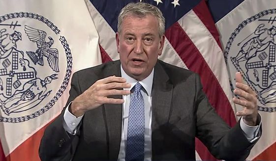 In this image taken from video, New York Mayor Bill de Blasio speaks during a virtual press conference, Thursday, Dec. 2, 2021, in New York. Multiple cases of the omicron coronavirus variant have been detected in New York, health officials said Thursday, including a man who attended an anime convention in Manhattan in late November and tested positive for the variant when he returned home to Minnesota. (AP Photo)