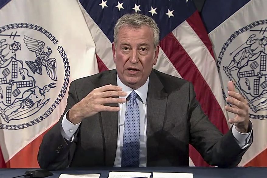 In this image taken from video, New York Mayor Bill de Blasio speaks during a virtual press conference, Thursday, Dec. 2, 2021, in New York. Multiple cases of the omicron coronavirus variant have been detected in New York, health officials said Thursday, including a man who attended an anime convention in Manhattan in late November and tested positive for the variant when he returned home to Minnesota. (AP Photo)
