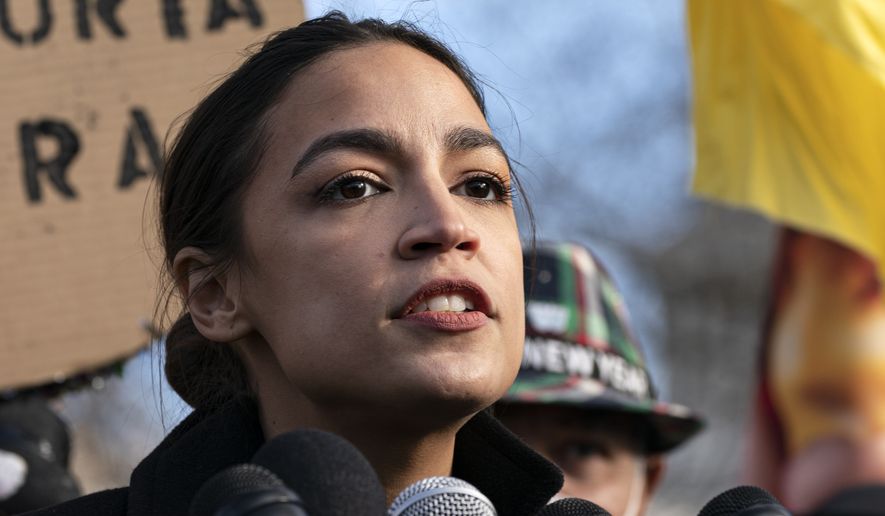 In this file photo, Rep. Alexandria Ocasio-Cortez, D-N.Y., speaks at a news conference Tuesday, Dec. 7, 2021, on Capitol Hill in Washington. (AP Photo/Jacquelyn Martin) ** FILE **