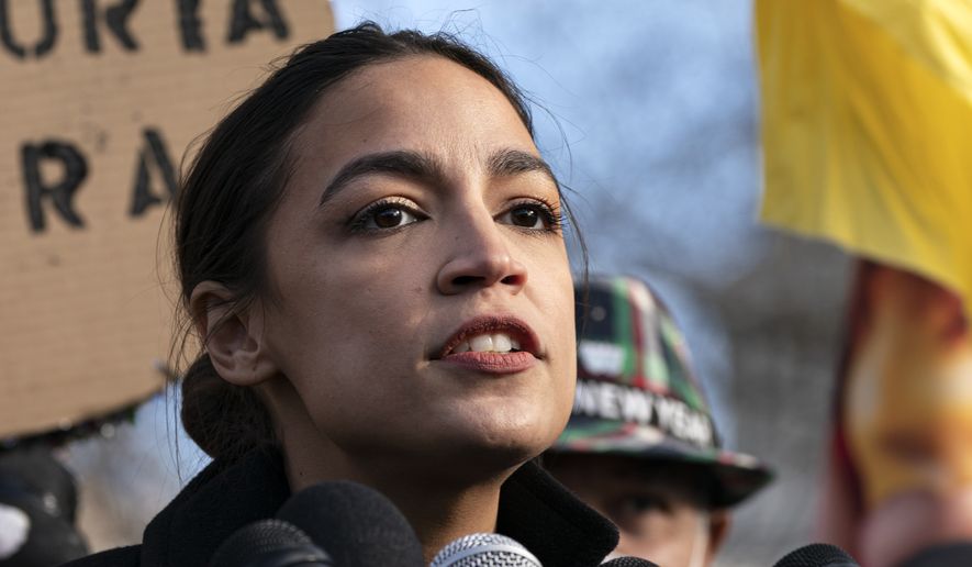 In this file photo, Rep. Alexandria Ocasio-Cortez, D-N.Y., speaks at a news conference urging the Senate to secure a pathway to citizenship in President Joe Biden&#x27;s legislative agenda Tuesday, Dec. 7, 2021, on Capitol Hill in Washington. (AP Photo/Jacquelyn Martin)  **FILE**