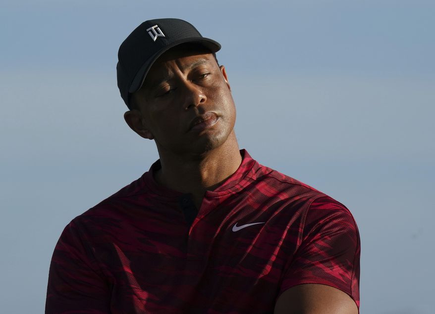 Tiger Woods gestures during the trophy ceremony of the Hero World Challenge PGA Tour at the Albany Golf Club, in New Providence, Bahamas, Sunday, Dec. 5, 2021.(AP Photo/Fernando Llano) **FILE**
