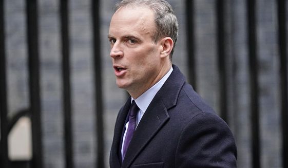 Deputy Prime Minister Dominic Raab, the former Foreign Secretary, arrives ahead of the government&#39;s weekly Cabinet meeting in Downing Street, in London, Tuesday, Dec. 7, 2021. Britain’s Foreign Office abandoned many of the nation’s allies in Afghanistan and left them to the mercy of the Taliban during the fall of the capital, Kabul, because of a dysfunctional and arbitrary evacuation effort, whistleblower Raphael Marshall alleged Tuesday. (Aaron Chown/PA via AP)