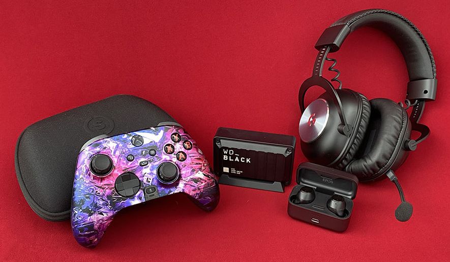 Gifts for gamers include Scuf Gaming&#39;s Instinct Pro controller, Logitech&#39;s G PRO X wireless headset, Western Digital&#39;s WD_Black, EPOS&#39; GTW 270 earbuds. (Photo by Joseph Szadkowski/The Washington Times) ** FILE **