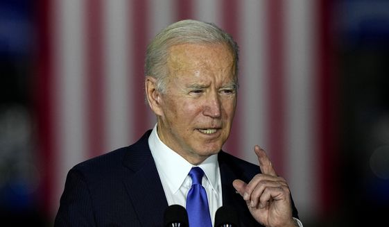 President Joe Biden talks about infrastructure during an event at the Kansas City Area Transit Authority Wednesday, Dec. 8, 2021, in Kansas City, Mo. (AP Photo/Charlie Riedel)
