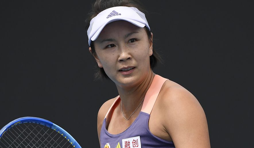 FILE - China&#39;s Peng Shuai reacts during her first round singles match against Japan&#39;s Nao Hibino at the Australian Open tennis championship in Melbourne, Australia on Jan. 21, 2020. IOC President Thomas Bach can&#39;t escape repeated questions about Peng and suspicions around two video calls the IOC has had with her. The questions keep coming. And Bach has acknowledged the situation is “fragile.” (AP Photo/Andy Brownbill, File)