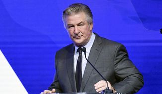 Alec Baldwin performs emcee duties at the Robert F. Kennedy Human Rights Ripple of Hope Award Gala at New York Hilton Midtown on Thursday, Dec. 9, 2021, in New York. (Photo by Evan Agostini/Invision/AP)