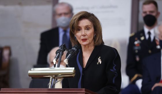 House Speaker Nancy Pelosi of Calif., speaks near the casket of former Sen. Bob Dole, who died on Sunday, during a congressional ceremony to honor Dole, who lies in state in the U.S. Capitol Rotunda in Washington, Thursday, Dec. 9, 2021. (Jonathan Ernst/Pool via AP) ** FILE **