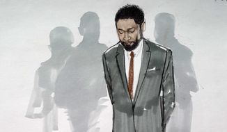 In this courtroom sketch, actor Jussie Smollett stands with his legal team in a Leighton Criminal Courthouse courtroom, Thursday, Dec. 9, 2021, in Chicago, after a jury found him guilty on five of six charges he staged a racist, anti-gay attack on himself and lied to police about it. (AP Photo/Cheryl Cook)