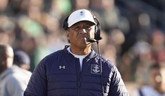 Navy head coach Ken Niumatalolo watches against Notre Dame in the first half of an NCAA college football game in South Bend, Ind., Nov. 6, 2021. No team&#39;s schedule has more bowl-bound opponents this season than Navy&#39;s, and that&#39;s part of the reason the Midshipmen are 3-8. The question now is whether that difficult schedule has prepared Navy for its biggest game of all — the annual clash with Army. (AP Photo/Paul Sancya, file) **FILE**