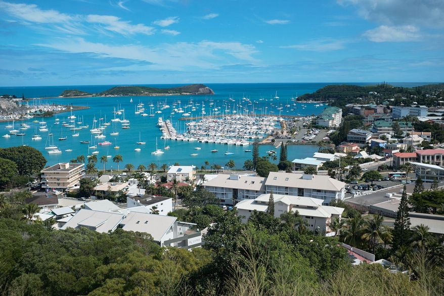 FILE - This May 9, 2018, photo shows a general view of the bay of Noumea, the capital of New Caledonia, a French territory in the South Pacific, with the yachting port in the background. The South Pacific archipelago of New Caledonia decides Sunday, Dec. 12, 2021, whether to break away from France, in a vote that is important for French geopolitical ambitions and is closely watched amid growing Chinese influence in the region. (AP Photo/Theo Rouby, File)
