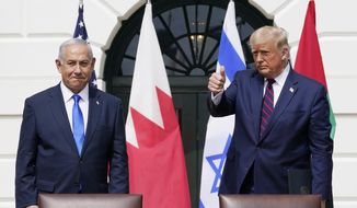 President Donald Trump and Israeli Prime Minister Benjamin Netanyahu attend the Abraham Accords signing ceremony on the South Lawn of the White House, in Washington, Sept. 15, 2020. Former President Donald Trump lashed out with profanity at Benjamin Netanyahu for congratulating President Joe Biden on his victory in last year&#39;s election, an Israeli newspaper reported Friday, Dec. 10, 2021. (AP Photo/Alex Brandon, File)