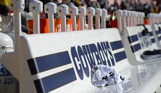 Dallas Cowboys&#39; benches are seen on the sideline prior to the start of the first half of an NFL football game against the Washington Football Team, Sunday, Dec. 12, 2021, in Landover, Md. (AP Photo/Mark Tenally) **FILE**