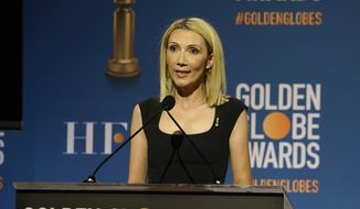 Helen Hoehne, president of the Hollywood Foreign Press Association, announces nominations for the 79th annual Golden Globe Awards at the Beverly Hilton Hotel on Monday, Dec. 13, 2021, in Beverly Hills, Calif. The 79th annual Golden Globe Awards will be held on Sunday, Jan. 9, 2022. (AP Photo/Chris Pizzello)