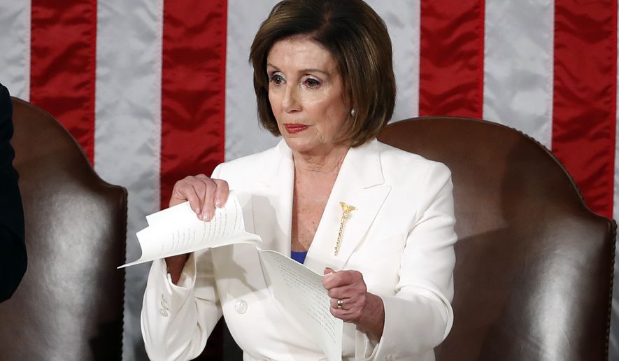 House Speaker Nancy Pelosi of Calif., tears her copy of President Donald Trump&#39;s State of the Union address after he delivered it to a joint session of Congress on Capitol Hill in Washington, Tuesday, Feb. 4, 2020. Vice President Mike Pence is at left. (AP Photo/Patrick Semansky)