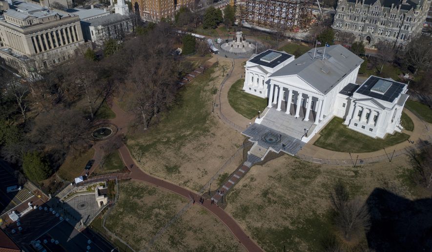 This Sunday, Jan. 19, 2020, file photo shows the Virginia State Capitol in Richmond, Va. A Virginia legislative branch agency has been hit by a ransomware attack, Gov. Ralph Northam's office said Monday, Dec. 13, 2021. The timing of the attack is particularly problematic, as lawmakers and staff are deep into preparations for a legislative session set to start in January. (AP Photo/Steve Helber)
