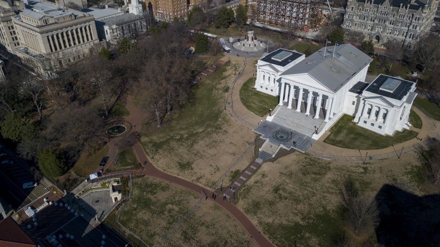 This Sunday, Jan. 19, 2020, file photo shows the Virginia State Capitol in Richmond, Va. A Virginia legislative branch agency has been hit by a ransomware attack, Gov. Ralph Northam's office said Monday, Dec. 13, 2021. The timing of the attack is particularly problematic, as lawmakers and staff are deep into preparations for a legislative session set to start in January. (AP Photo/Steve Helber)