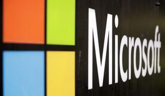 The Microsoft company logo is displayed at their offices in Sydney, Australia, on Wednesday, Feb. 3, 2021. (AP Photo/Rick Rycroft) **FILE**