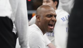 Memphis&#39;s head coach Penny Hardaway talks with his players in the first half of an NCAA college basketball game against Alabama Tuesday, Dec. 14, 2021, in Memphis, Tenn. (AP Photo/Karen Pulfer Focht)
