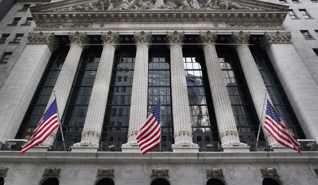 This Nov. 23, 2020 file photo shows the New York Stock Exchange in New York. Stocks are edging lower in early trading on Wall Street Wednesday, Dec. 15, 2021, as traders wait to hear from the Federal Reserve after its last policy statement of the year. (AP Photo/Seth Wenig, File)