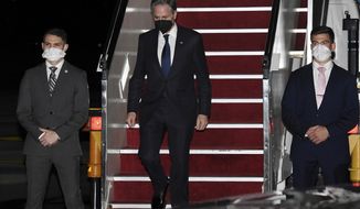 Secretary of State Antony Blinken arrives at Subang Airport, in Kuala Lumpur, Malaysia on Tuesday, Dec. 14, 2021. (Olivier Douliery/Pool via AP)