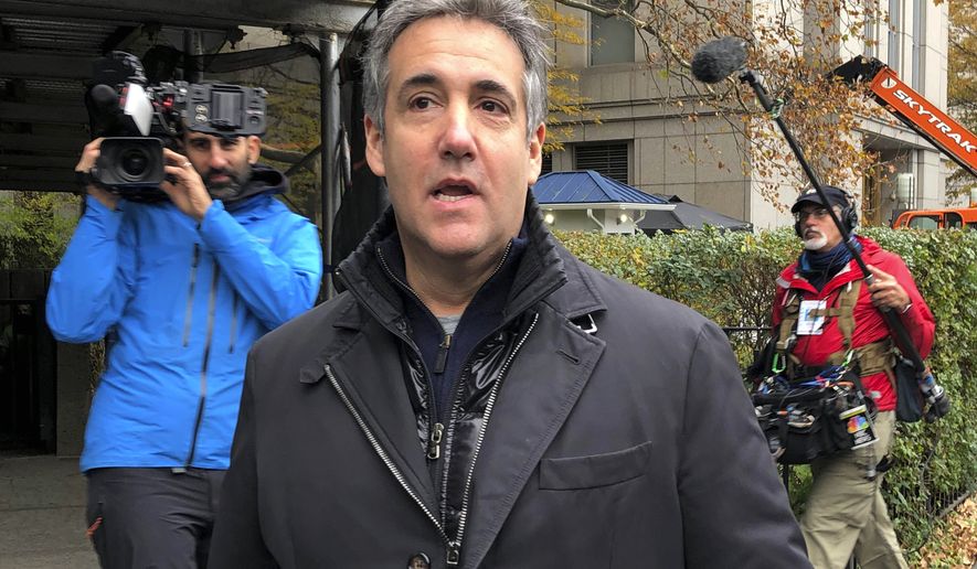 FILE - Michael Cohen, former President Donald Trump&#39;s longtime personal lawyer, arrives at Federal Court in New York, on Nov. 22, 2021, after completing his three-year prison sentence. Cohen claimed in a new lawsuit Thursday, Dec. 16, 2021, that Trump retaliated against him for writing a tell-all memoir, saying his abrupt return to federal prison last year endangered his life and amounted to punishment for criticizing the president. (AP Photo/Lawrence Neumeister, File)